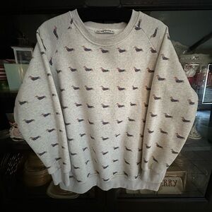 Gray sweatshirt with dachshunds on it. 
Size XL Never worn. Super soft